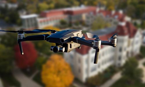 A student flying a drone